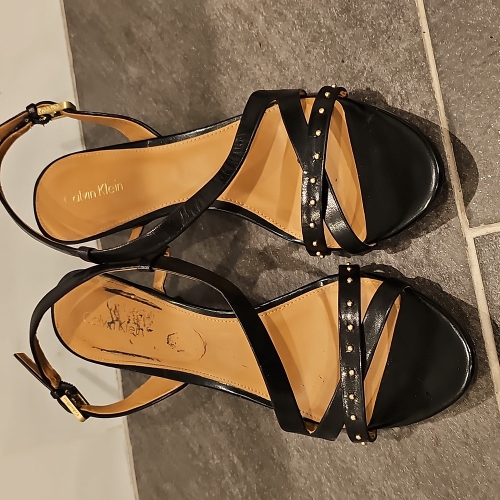 Gold studded black strappy heels